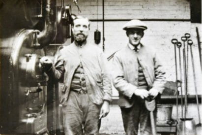  Photograph of Edward J Godden and Frederick T Millard, two engineers at the University Extension College. From: From ‘Stoking the Boilers’, Tales from the archives: Snapshots of early academic life at Reading, [article], (November 22nd, 2022), <https://blogs.reading.ac.uk/tales-from-the-archives/category/london-road-campus/page/2/> (Last accessed: 13/01/2026)